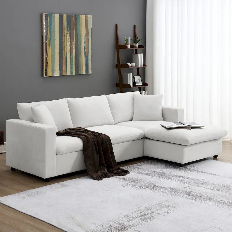 Sofá seccional en L de 4 plazas en gris/negro/blanco/beige con otomana