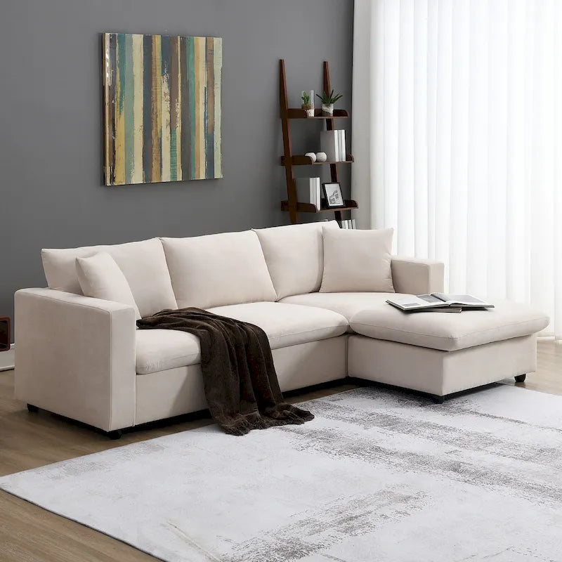 Sofá seccional en L de 4 plazas en gris/negro/blanco/beige con otomana