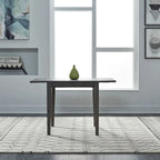 Mesa de comedor gris con alas abatibles, capacidad 2–4 personas