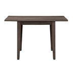 Mesa de comedor gris con alas abatibles, capacidad 2–4 personas