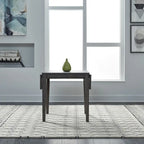 Mesa de comedor gris con alas abatibles, capacidad 2–4 personas